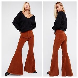 Free People corduroy extreme ultra super flare bell bottoms in burnt orange/rust